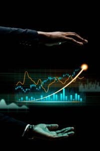 imagen conceptual sobre que es un accionista, manos sosteniendo graficos de crecimiento